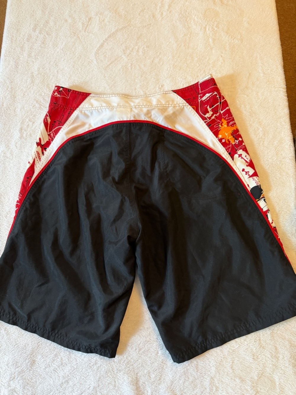 Nike Men’s Black Board Shorts with Red Graphic Side Panels - Picture 2 of 3